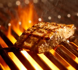 Crédence de cuisine en verre imprimé Grill / Barbecue salmon fillet on the grill with flames
