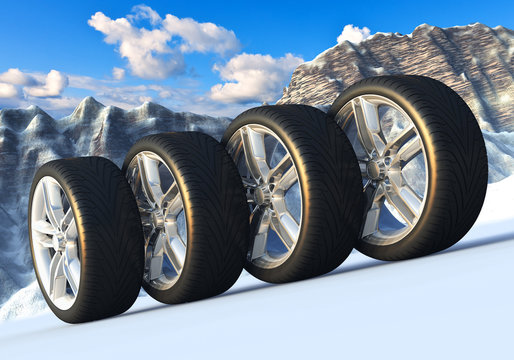 Set of car wheels in snowy mountains