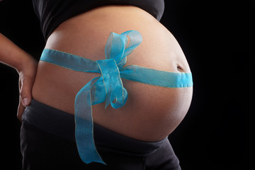 Pregnancy and blue ribbon