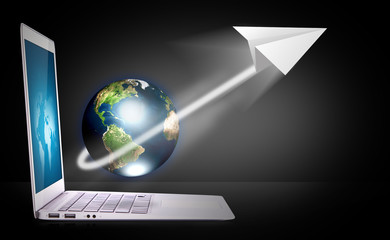 laptop  with earth and paper plane
