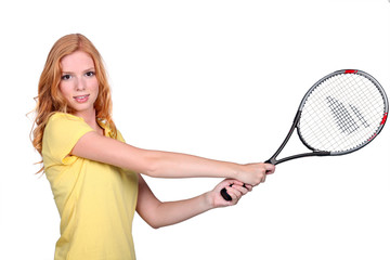 Lady playing tennis