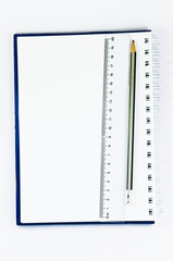 Pencil and ruler on the in white background