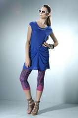 fashion model wearing modern sunglasses posing