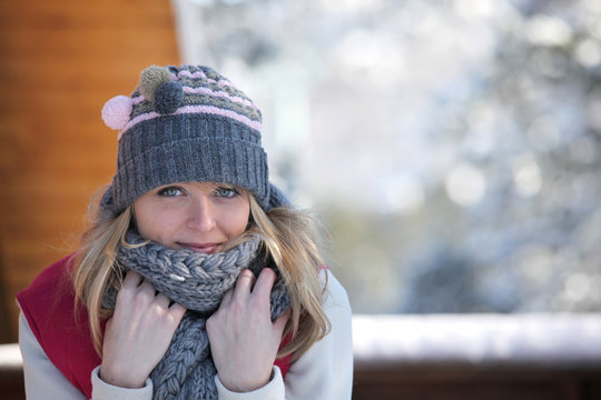 Woman in a hat and scarf