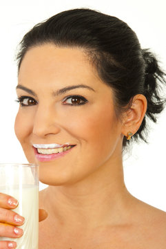 Happy woman drinking milk