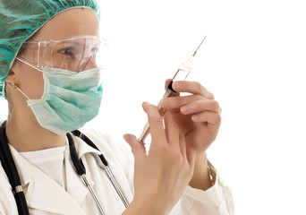 Doctor wearing a mask, the hands of needles. Wearing white coat.