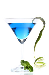 Blue cocktail in martini glass isolated on white