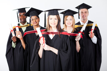 group of international graduates on white background