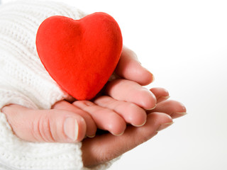 Hands warm heart on a white background.