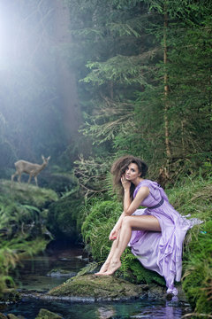 Cute woman in nature scenery