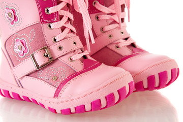 Children's pink boots,  isolated.