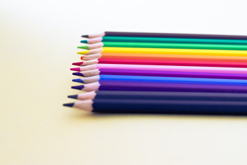 rainbow of pencil colours, selective focus