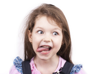Little funny expressive girl with her tongue out, isolated © Marine
