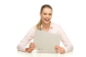 Fototapeta premium Woman holding blank paper