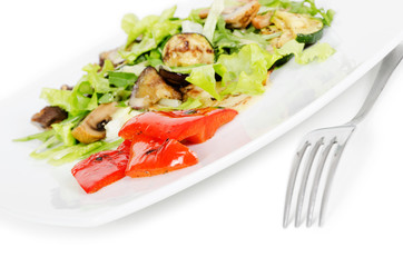 beef salad with grilled vegetables on white background