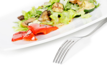 beef salad with grilled vegetables on white background