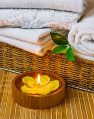 Obraz na płótnie Canvas Spa with towels and candle