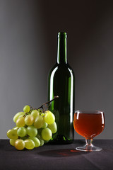 Wineglass and grapes