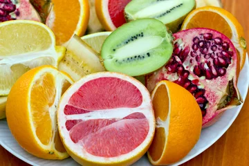 Photo sur Plexiglas Tranches de fruits Tranches de fruits tropicaux frais