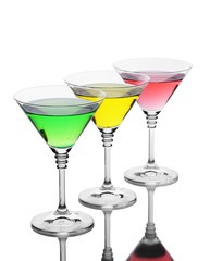 alcoholic cocktails on table isolated on white