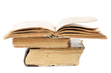 Pile of old books isolated on white background