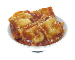 Ravioli filled with cheese in small dish