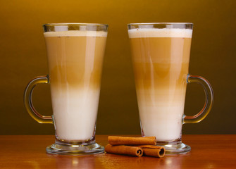 Fragrant сoffee latte in glass cups and cinnamon