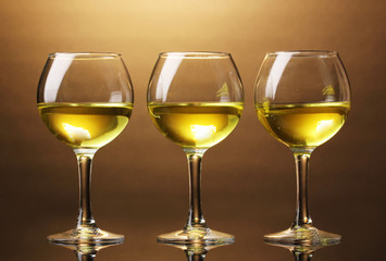 Wineglass on brown background