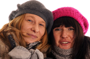 Two young women in winter clothes