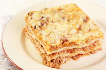 Italian cuisine. Meat lasagna on plate