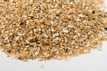 Pearl barley heap isolated on white