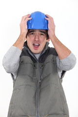 Builder realizing his mistake