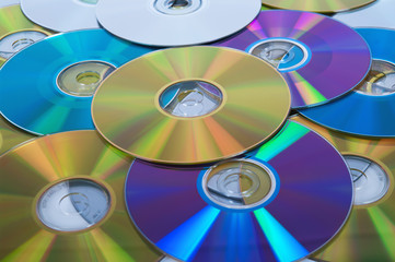 some colorful compact discs