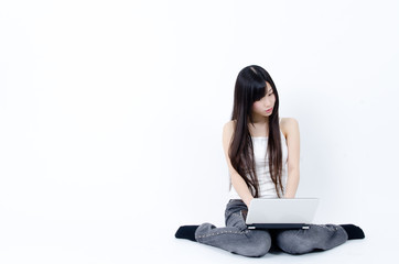 attractive asian woman using laptop computer