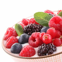 bowl of berries and yogurt