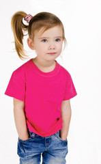 Portrait of cute little girl in jeans and t-shirt