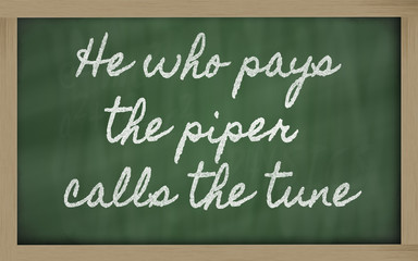 Obraz premium expression - He who pays the piper calls the tune - written on