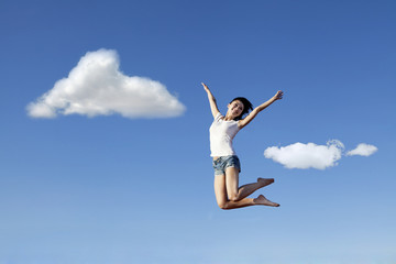 Fototapeta na wymiar Asian woman jumping happily