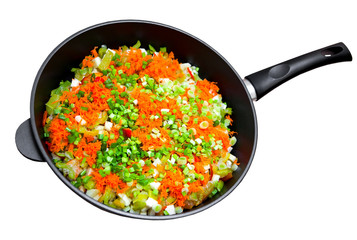 Frying pan with the cut vegetables