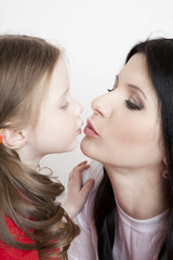 Portrait of a beautiful mother and daughter