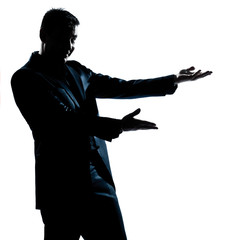 silhouette man portrait showing pointing empty copy space