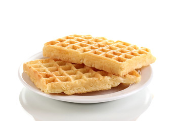 Sweet waffles on plate isolated on white