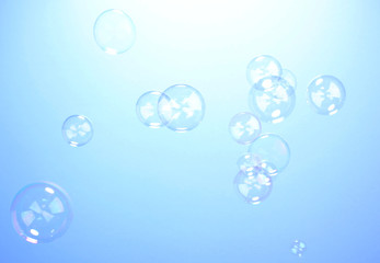 Soap bubble on blue background