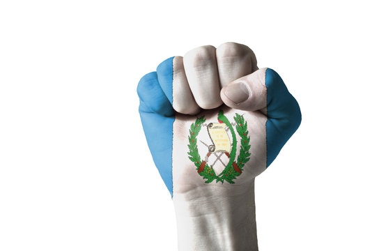 Fist painted in colors of guatemala flag