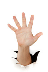 Hand through a hole in paper