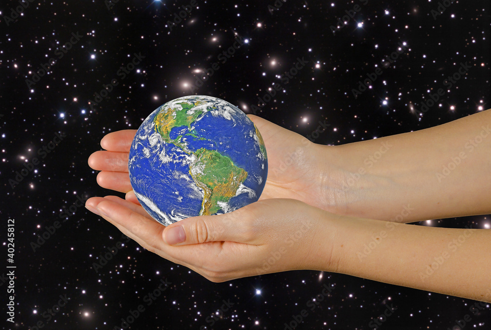 Wall mural planet earth on palms.elements of this image furnished by nasa