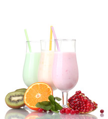 Milk shakes with fruits isolated on white