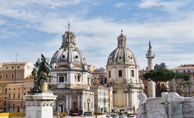 Fototapeta premium Trajan's Column and church in Rome, Italy