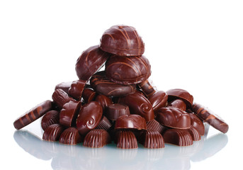 Many different chocolate candy isolated on white