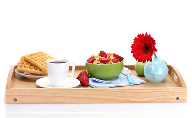 light breakfast on wooden tray isolated on white
